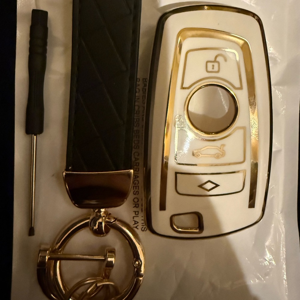 BMW White and Gold elegant, sleek, and protective key fob cover.